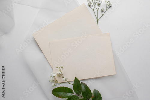 mockup card with plants. invitation card with environment Mockup with postcard 

card mockup with white flowers and envelope. wedding invitation 