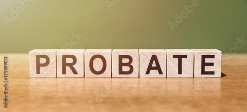 Probate word made of square letter word on green-brown background. photo