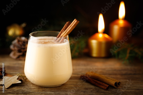 Eggnog - egg and cinnamon milk cocktail for Christmas and winter holidays.