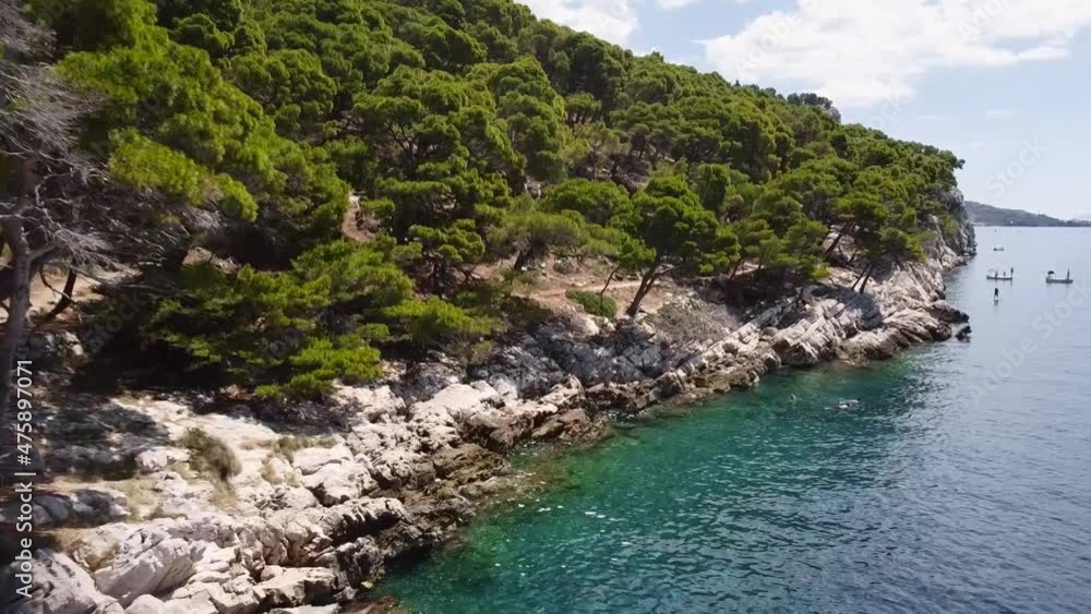 A beautiful Croatian coast beach with an amazing contrast between the light and dark. Its name is Makarska. A beautiful Croatian coast beach with an amazing contrast between the light and dark. Its name is Makarska.