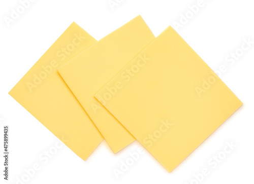 Slices of cheese for burger isolated on white background. Leerdammer Cheese top view.
