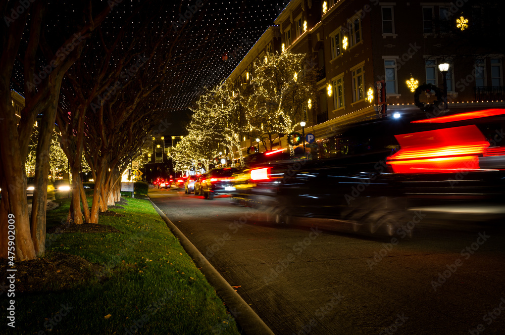 Busy urban street beautifully illuminated for Christmas