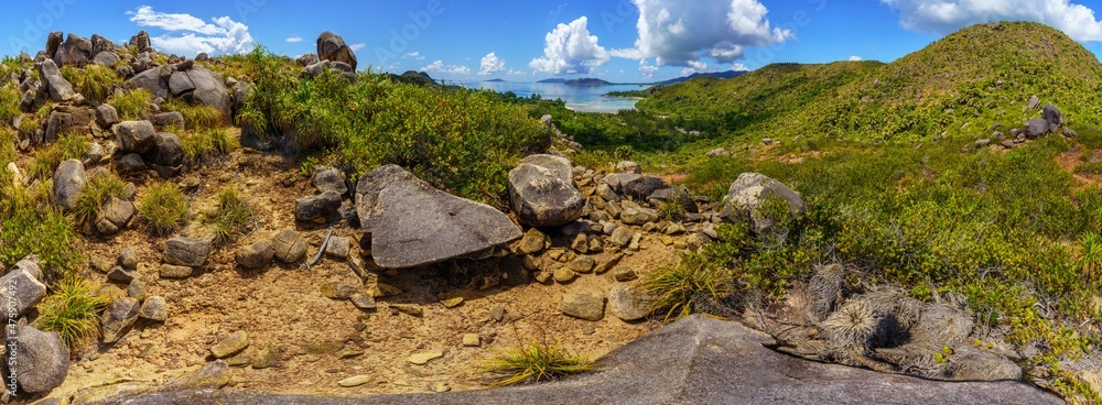 Obraz premium hikink through the jungle on curieuse island on the seychelles