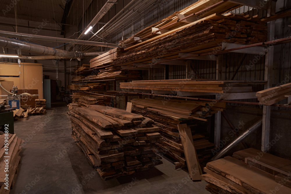 Focused photo on wooden plates being in workshop