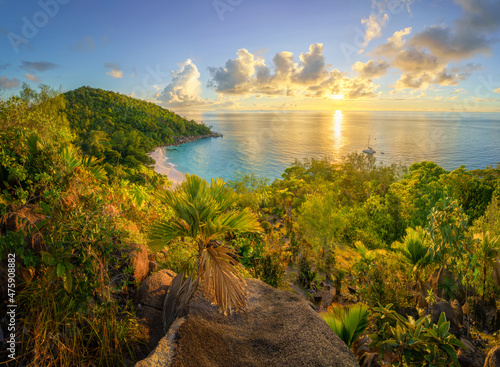 sunset at tropical beach anse georgette on praslin on the seychelles