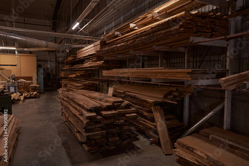 Focused photo on wooden plates being in workshop