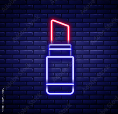 Glowing neon line Lipstick icon isolated on brick wall background. 8 March. International Happy Women Day. Colorful outline concept. Vector