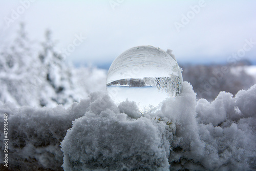 A Glass ball in deep snow © Claudia Evans 