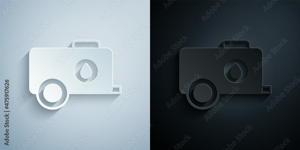 Paper cut Mobile water tank - bowser icon isolated on grey and black background. Water tank delivering water. Paper art style. Vector Paper cut Mobile water tank - bowser icon isolated on grey and black background. Water tank delivering water. Paper art style. Vector