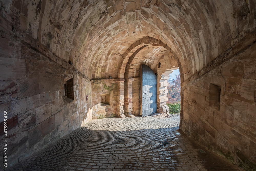 Tunnel in the wall to the entrance of a castle