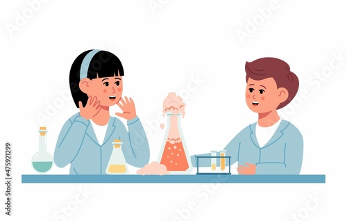Little Students Doing Chemical Experiment. Chemistry laboratory. Little boy and girl scientist in classroom at chemistry lesson. School chemical laboratory with glass flask and test tubes. 