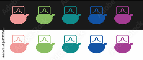 Set Traditional tea ceremony icon isolated on black and white background. Teapot with cup. Vector