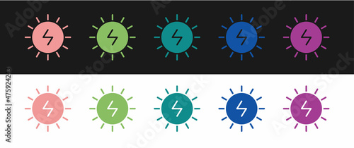 Set Solar energy panel icon isolated on black and white background. Sun with lightning symbol. Vector