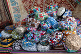 Uzbekistan, in the city of Bukhara, beautiful handmade traditional caps.