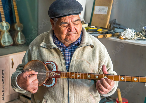 Uzbekistan, in the city of Qarshi ( Karshi) a lute maker in his workshop. Quarshi 19/10/2021