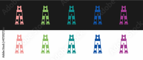 Set Fisherman rubber pants icon isolated on black and white background. Vector