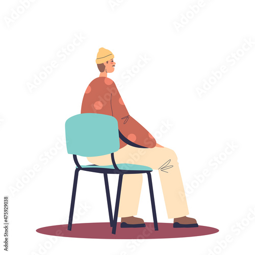 Man sitting on chair, back view. Guy listen to courses, therapy or lecture participant