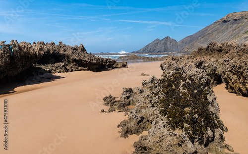 Stone formations on the Aljezur coast in the Algarve, Portugal. Winter time, low tide.
