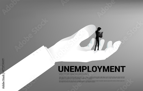 silhouette of Unemployment man walking in big hand. Concept for end of career and jobless.