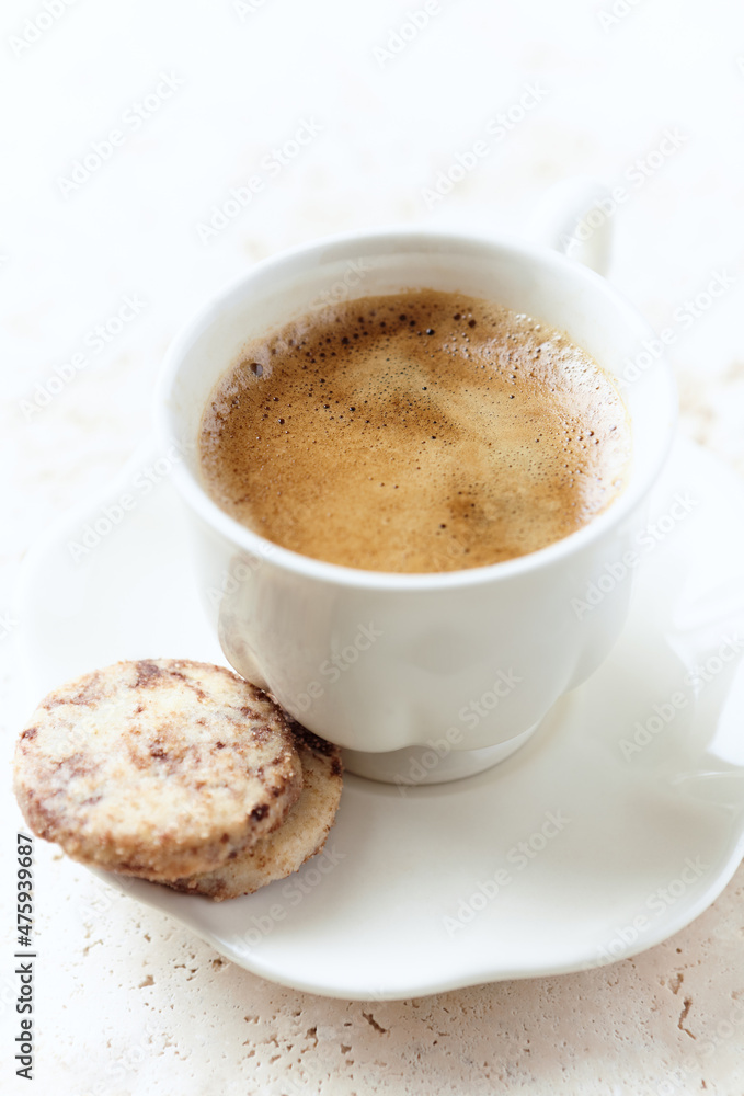 Cup of Coffee on bright stone background. Close up. Cup of Coffee on bright stone background. Close up.