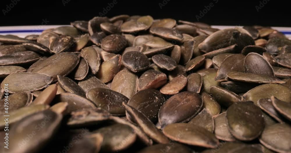 Pumpkin seeds in a pile probe lens macro Pumpkin seeds in a pile probe lens macro