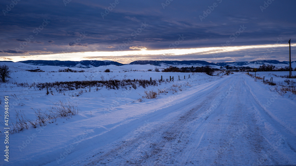 Snowy access road off highway 90 in Wyoming, view of Yellowstone