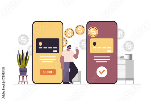 businessman sending or receiving dollar coins via smartphones money transfer payment financial transactions