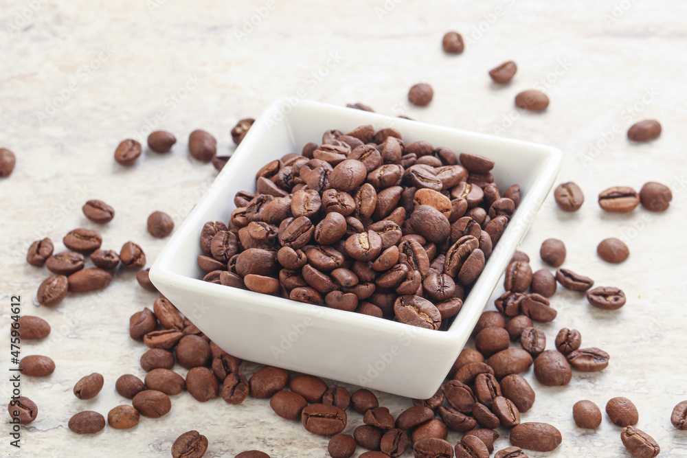 Roasted coffee bean in the bowl Roasted coffee bean in the bowl