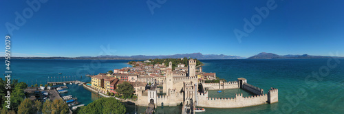 Lake Garda, Sirmione, Italy. Sirmione aerial view. Top view, historic center of the Sirmione peninsula, lake garda. Autumn in Sirmione. Aerial panorama of Sirmione.