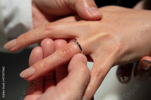 The moment of exchanging rings at a wedding