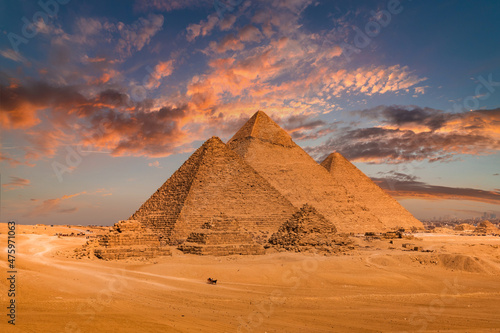 Fototapeta Sunset view of Pyramid complex of Giza, in Cairo, Egypt.