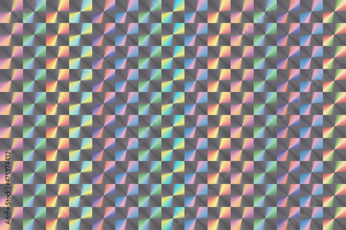 Hologram sticker background. Modern holo paper background with colored overflows. Colourful retro rainbow hologram paper.