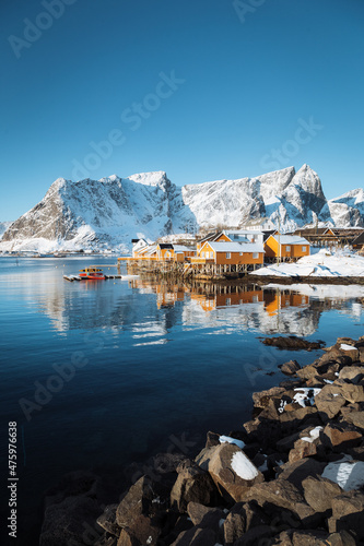 Obraz na płótnie Lofoten winter scenery with traditional fisherman Rorbuer cabins, Sakrisoy, village of Reine, Norway w salonie