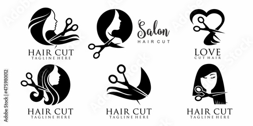 Obraz na plátně logo collection A beautiful woman having her hair cut by hairdresser scissors