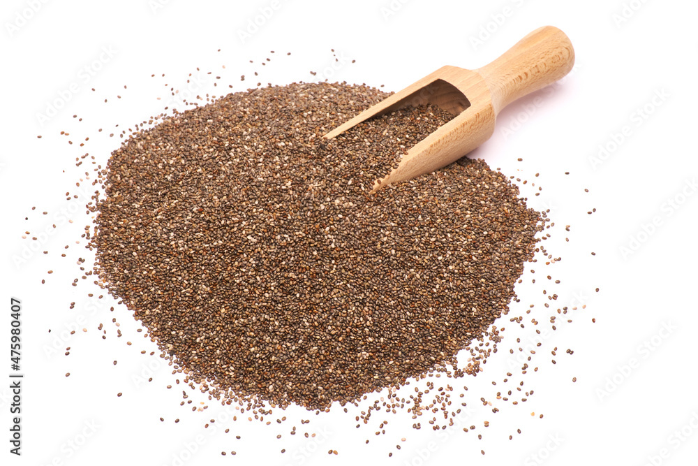 Wooden scoop of organic natural chia seeds close-up isolated Wooden scoop of organic natural chia seeds close-up isolated
