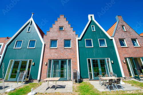 Fototapeta Naklejka Na Ścianę i Meble -  Volendam homes on a sunny spring day, The Netherlands.