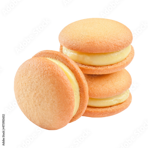 Almond sandwich biscuits with custard isolated on white background