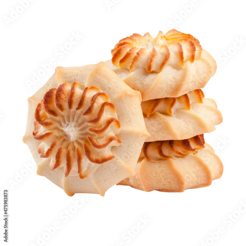 Crispy swirl shaped shortbread cookies with curd cream isolated on white