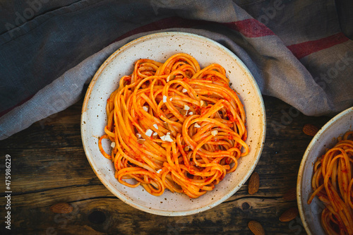 Studio shot of bowl of vegan linguini with sauce photo