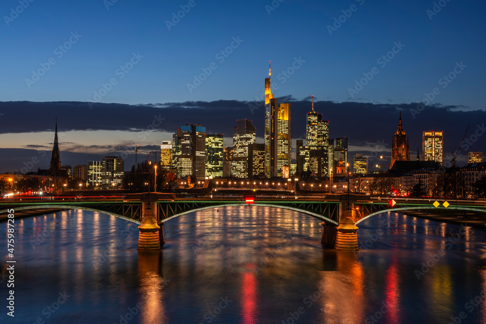 Germany, Hesse, Frankfurt, Ignatz Bubis Bridge at night with illuminated downtown skyline in background Germany, Hesse, Frankfurt, Ignatz Bubis Bridge at night with illuminated downtown skyline in background