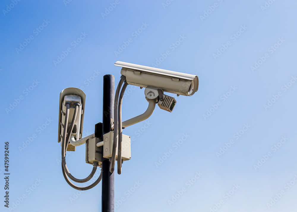 CCTV camera installed outside the building safety protection concept. CCTV camera installed outside the building safety protection concept.