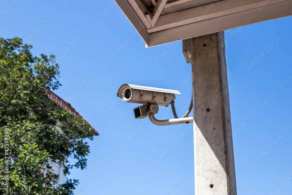 CCTV camera installed outside the building safety protection concept. CCTV camera installed outside the building safety protection concept.