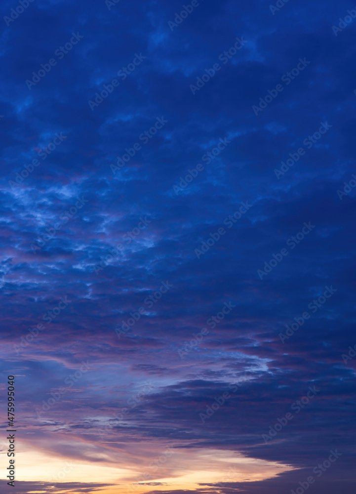 Obraz premium Beautiful view of sky with clouds at sunrise. Partly cloudy. Colorful sunset. Natural blue sky background texture, beautiful color.