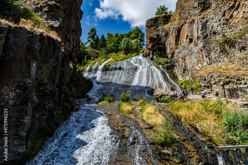 Beautiful flowing waterfall in the mountains of Jermuk, Armenia photo