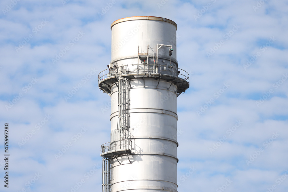 Close-up photography of industrial metallic silver chimney. Close-up photography of industrial metallic silver chimney.