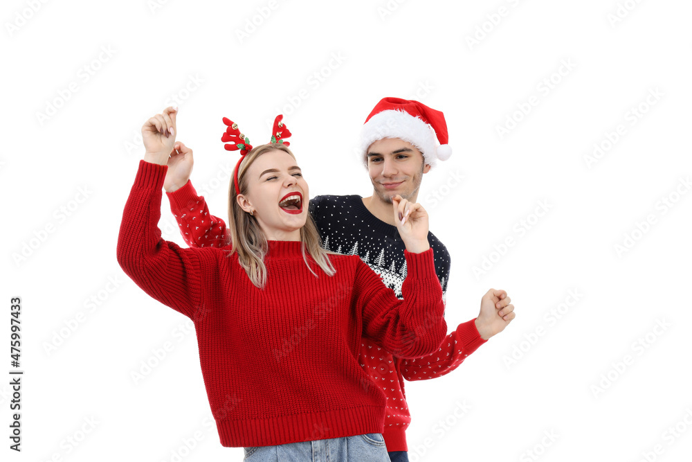 Couple in Christmas clothes isolated on white background Couple in Christmas clothes isolated on white background