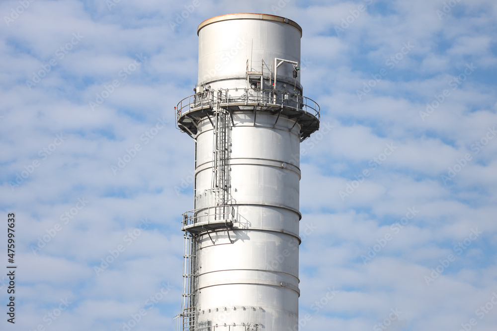 Close-up photography of industrial metallic silver chimney. Close-up photography of industrial metallic silver chimney.