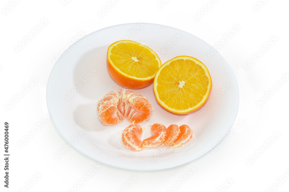 Tangerine and orange on white dish on a white background Tangerine and orange on white dish on a white background