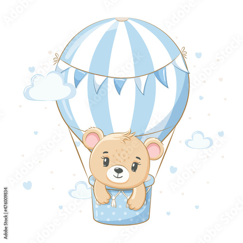 Fotografia A cute teddy bear is flying in a balloon