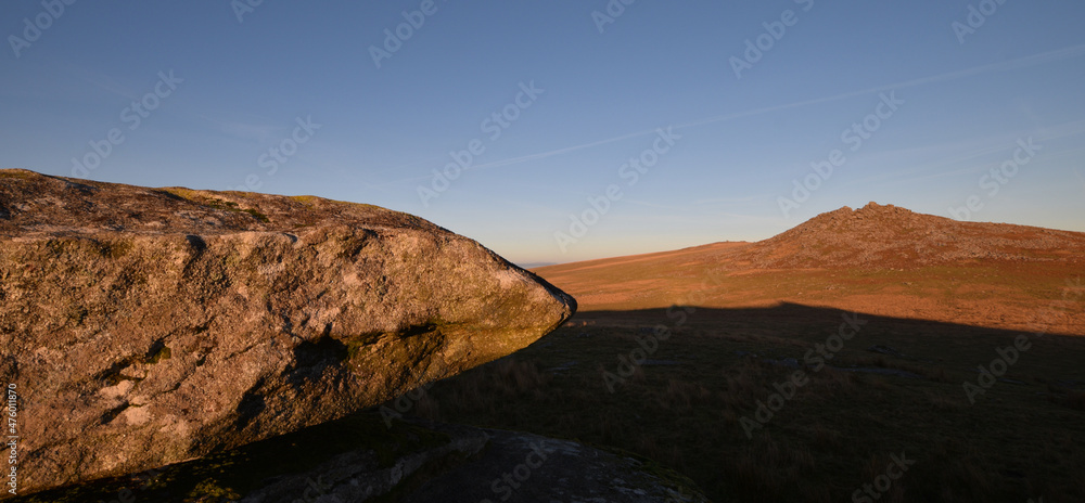A weathered boulder by Rough Tor Bodmin Moor at sunset